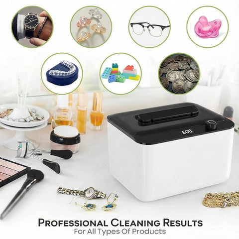 Hassle Free 45KHz Ultrasonic Jewelry Cleaner With Six Time Modes Cleans Rings Eyeglasses Watch Straps And Dentures Pretty Quick on a vanity with various items.