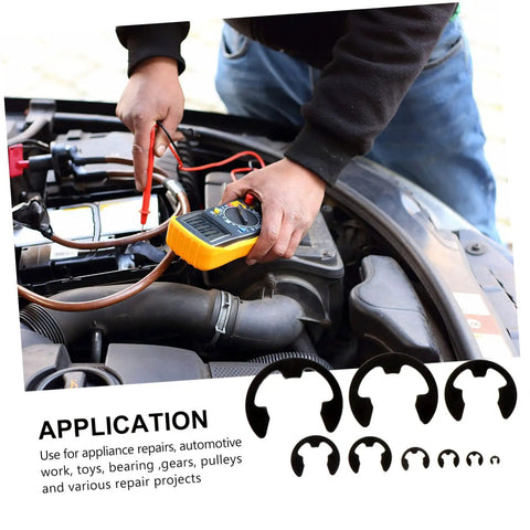 Person using a meter in a car engine bay next to external retaining snap ring kit with 328 pieces steel assortment 1.5mm to 22mm