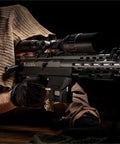 Sniper aiming with Gas Powered Metal DSR-1 Bullpup Airsoft Rifle In Dark Earth With 6mm Pro-Grade Build And Realistic Blowback