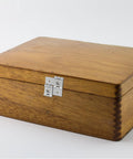 Wooden box with Heavy Duty 4 Pack Double Swing Door Hinges For Furniture And Screens In Silver Iron, 25mm hole spacing visible.
