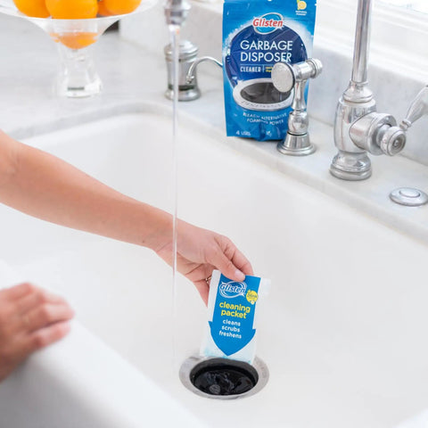 Foaming Garbage Disposer Cleaner Twenty Pack With Lemon Scent deep cleaning packet being used in a sink