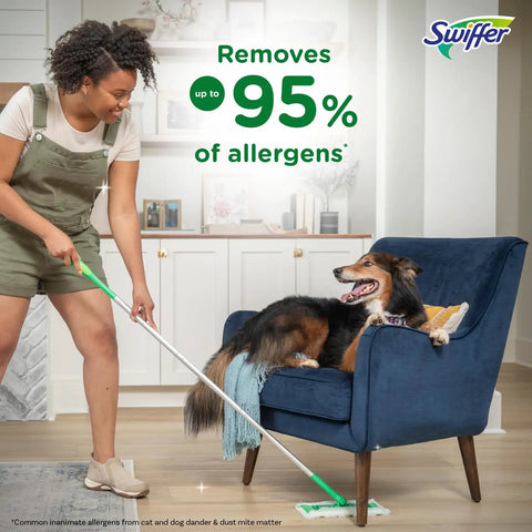 Person using 2-In-1 Floor Mop And Sweeper Starter Kit With 1 Mop And 19 Refills near dog on chair, removes allergens.