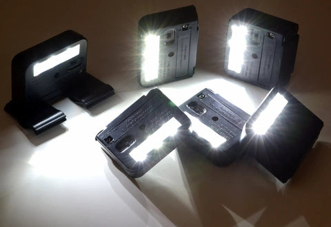Wunder Solar Powered Spotlight Ultra Bright 3X LED Clip On Stick On Outdoor Light illuminating a dark area