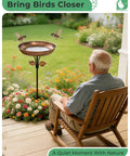 Man sitting in garden near Sturdy Metal Bird Bath Garden Stake With 12 Inch Bowl Outdoors 0.7 Gallon Capacity Yard Decor For Birds No Fuss Setup And Durable Weatherproof Design Included.