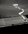 Close-up of water flowing off waterproof and dustproof hydrophobic prefilter mesh for air filters 18 by 18 inch fabric.