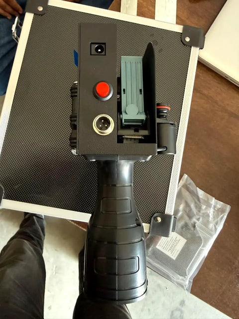 Hella Portable Handheld Inkjet Printer With Rechargeable Battery Tough Carry Case And Instant Print Setup For Quick Job Site Product Coding Marking And Shipping Label Jobs Anywhere top view showing control panel and cartridge slot