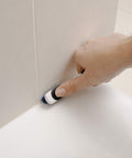 Blue Good Grips Deep Clean Brush Set small brush with wiper blade cleaning bathroom grout, non slip comfort grip displayed