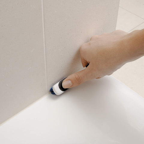 Blue Good Grips Deep Clean Brush Set small brush with wiper blade cleaning bathroom grout, non slip comfort grip displayed