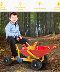 Child sitting on Kids Ride On Sand Dumper Outdoor Sandbox Toy With Ergonomic Handle And Four Wheels Built Tough Metal Wheelbarrow Style Digging Tool For Boys And Girls Red in wooded area