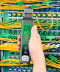 Technician using KFI-40 Fiber Optic Detector And Live Identifier For 0.25mm, 0.9mm, 2.0mm And 3.0mm Cables at a fiber distribution panel