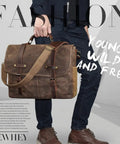 Top Tier Mens Messenger Bag Built Tough From Crazy Horse Leather And Hella Waterproof Waxed Canvas With Secure Compartments Fits 15.6 Inch Laptop For Daily Commute Work held in hand with a shoulder strap.