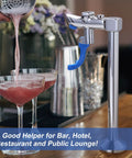 Self Service Glass Filler Faucet For High Traffic Bars Hotels Cafes 9 Inch Deck Mount Water Filler Station Stainless Steel Drinking Faucet For Fast Refills And Clean Water alongside a cocktail being poured.