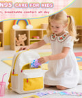 Child inserting Kids KN95 Face Mask Disposable 50 Pack Small Size For Children Breathable Unicorn Design For Girls into a backpack