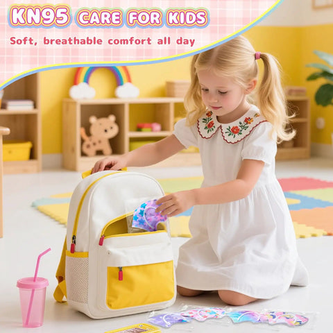 Child inserting Kids KN95 Face Mask Disposable 50 Pack Small Size For Children Breathable Unicorn Design For Girls into a backpack
