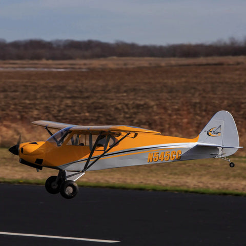 Carbon Cub 15cc ARF Ready To Fly RC Plane With Laser Cut All Wood Construction in flight on runway with tundra wheels