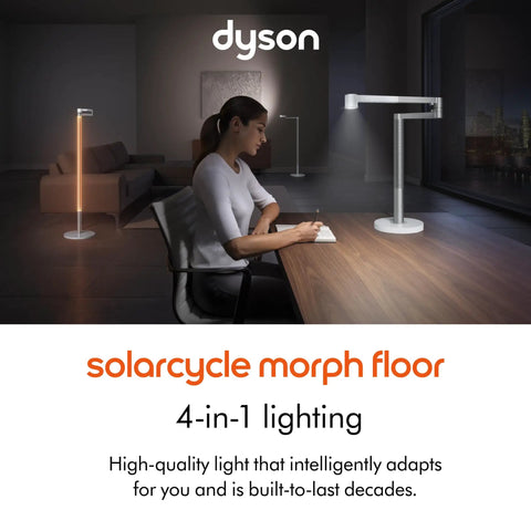 Woman working in living room lit by Solarcycle Morph Floor Light CF06 Smart Multi Mode Lamp with Task Indirect Feature and Ambient Lighting