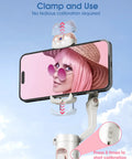3-Axis Smartphone Gimbal Stabilizer With AI Tracking And Fill Light clamping a phone displaying a woman in a hat and sunglasses