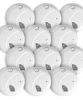 12 Pack Interconnect Hardwire Smoke Alarms With Built In Battery Backup Voice And Location Warnings Dead On Precision Detection. White smoke detectors from multiple angles.