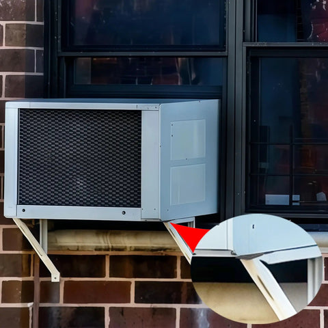 Outdoor AC condenser with Eight Pack Mini Split Anti Vibration Rubber Pads on wall mount, close-up of pad detail.