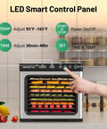 Sweet 9 Tray Stainless Steel Food Dehydrator with Digital Timer and Temperature Control, LED display, various foods inside.