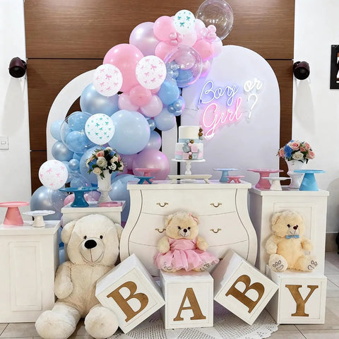 Pastel Pink and Blue Gender Reveal Balloons Set 60 Pack 12 Inch Includes 20 Pink 20 Blue 10 Pink Bow Print 10 Blue Bow Print Balloons Plus Ribbon for Easy Decorating Perfect for Baby Shower or Boy or Girl Reveal with plush bears and cake table