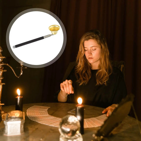 Telescopic Candle Fire Extinguisher With Extensible Copper Wick Snuffer For Home Safety on a table with candles and a woman.