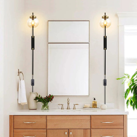 Dope Black Globe Shade Wall Sconces Set Of 2, Modern Indoor Plug-In Lamps with glass lampshades beside bathroom mirror