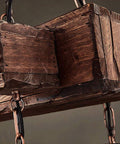 Close-up of Industrial Vintage Wooden Pendant Light With Glass Lanterns, Rustic wood grain and metallic chain details.