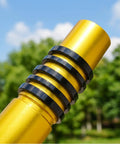 Stack of 9Pcs Bike Stem Spacers Set Aluminum Alloy Headset Spacers for 1 1/8 Inch Stems shown on gold steerer outdoors