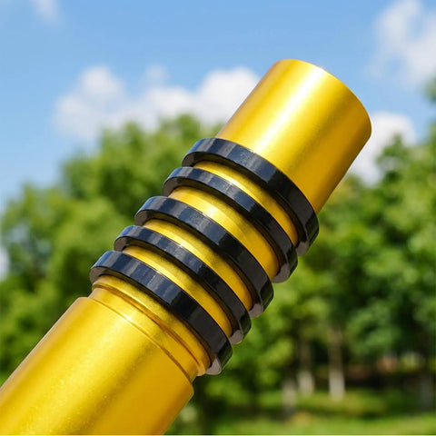 Stack of 9Pcs Bike Stem Spacers Set Aluminum Alloy Headset Spacers for 1 1/8 Inch Stems shown on gold steerer outdoors