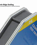 Two blue welding magnets with metal housings and a yellow label; close-up 90-degree fixture view