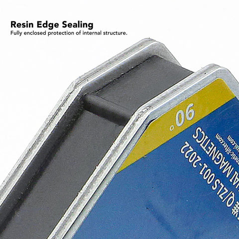 Two blue welding magnets with metal housings and a yellow label; close-up 90-degree fixture view