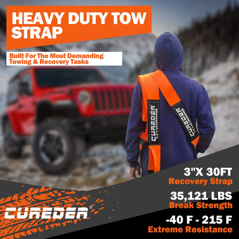 Person holding Heavy Duty Tow Strap 3 Inch By 30 Foot Snatch Recovery Rope for off-road towing with red vehicle in background.
