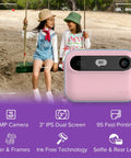 Kids Instant Print Camera Insta 20 Hybrid Digital And Instant Photo Printer For Ages 4 To 12, 7 Second Inkless Printing, Selfie Frames, Easy Controls, Creative Frames, Great Birthday Gift pink compact camera with kids using swing