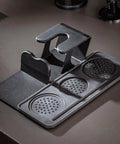 Daily Driver Barista Coffee Accessories Set Featuring Calibrated Spring Tamper Stirring Needle And Distribution Tool For Truly Smooth Espresso Pulls At Home, black plastic espresso tool holder and distributor.