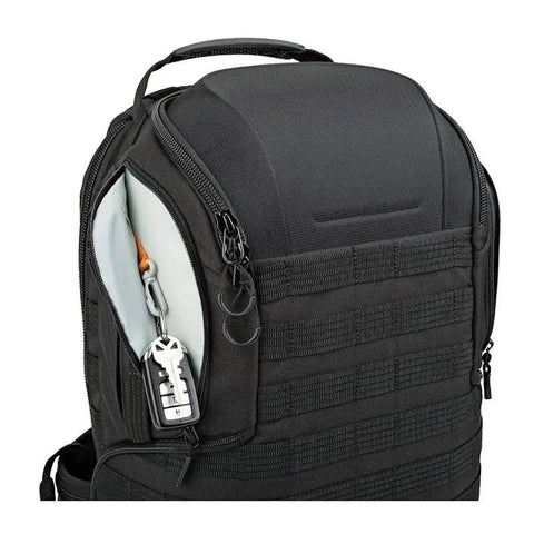 Close-up of ProTactic 350 AW II Modular Camera Backpack showing zippered side pocket and durable black exterior.