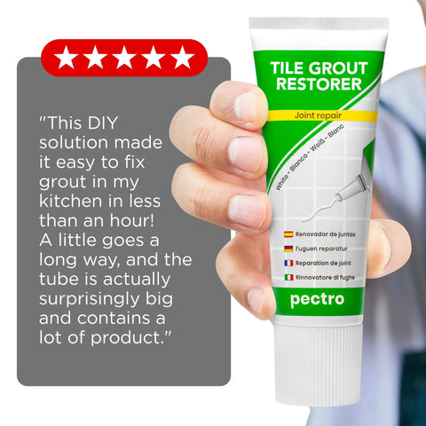 Hand holding White Tile Grout Repair XL Odorless Fast Drying Grout Filler For Bathroom And Kitchen Restores Cracks Gaps Lines And Joints