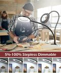 Man using 8X Magnifying Glass With Light On A Stand, 24 Inch Flexible Gooseneck Floor Lamp with Five Color Modes for crafting.