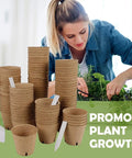 Woman with Seedling Pots 45 Pack with Labels for Easy Germination and Root Care, arranging herbs on table.