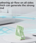 Rechargeable Desk Fan With 4500mAh Battery, Foldable 180 Degree Portable Personal Fan on table near sofa, airflow arrows