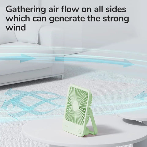 Rechargeable Desk Fan With 4500mAh Battery, Foldable 180 Degree Portable Personal Fan on table near sofa, airflow arrows