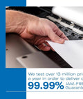 Hand inserting paper into printer showcasing jam-free guarantee