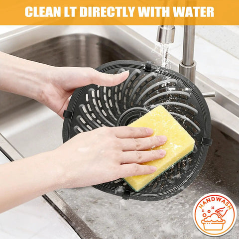 Washing Vortex 7 Qt Air Fryer Replacement Grill Pan under sink faucet with sponge cleaning, showing ease of cleaning feature.