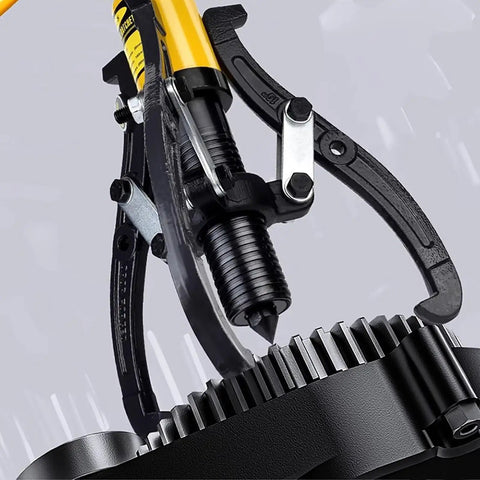 No Sweat 20 Ton Hydraulic Gear Puller Kit For Industrial Bearing Removal And Shaft Pulley Extraction With Forged Steel Jaws Pro Grade Garage Workhorse Tool gripping a gear.