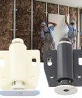 Push To Open Magnetic Cabinet Door Catch With ABS Plastic Round Buffer in black and beige finish shown in front of construction scene