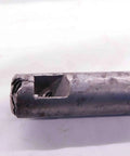 Close-up of a four piece vintage lathe tool holder set showing steel construction and precision cutoff feature.