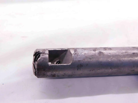 Close-up of a four piece vintage lathe tool holder set showing steel construction and precision cutoff feature.