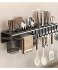 Rock Solid Wall Mounted Storage Rack With No Drill Setup Heavy Duty Carbon Steel Heat Resistant kitchen shelf with utensils and tools.
