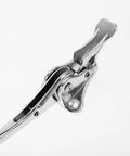 Close-up of Heavy Duty Zinc Alloy Wall Door Stop With Silver Minimalist Design Kickdown Door Stopper, showing hinge mechanism.