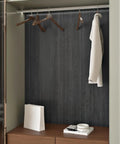 Dope Black Wood Look Countertop Contact Paper Self Adhesive For Kitchen Counters in closet with hangers and shelf.